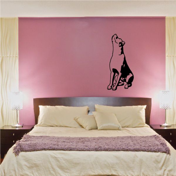 Howling rottweiler decal, black silhouette on a light surface