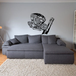 Motorcycle headlight decal sticker with detailed black-and-white design on wall