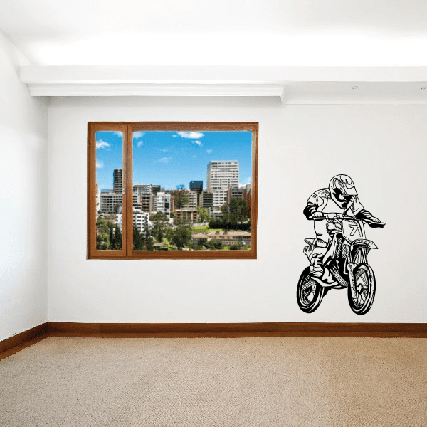 Black line-art dirt bike racer decal with helmeted rider