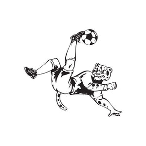 Soccer wall decal of a cartoon player kicking a ball with a pawed mascot