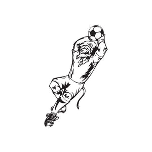 Soccer wall decal of black-and-white player kicking a soccer ball