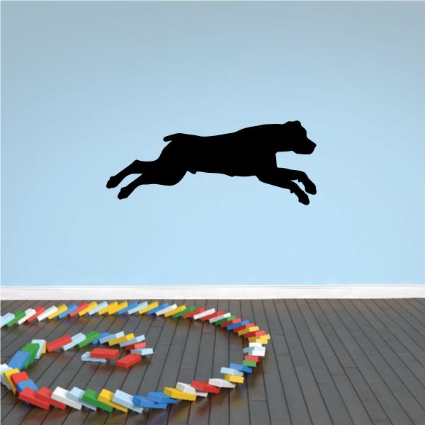 Diving rottweiler dog decal in solid black silhouette