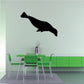 Diving seal decal with black silhouette diving downward