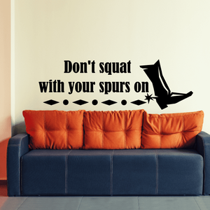Vinyl wall decal with black cowboy hat and quote: “Don't squat with your spurs on”