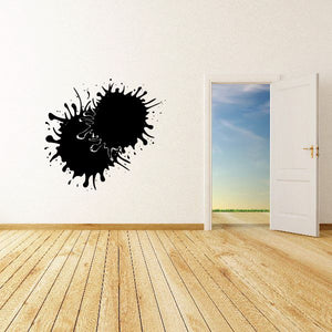 Black paint splatter wall decal with round spray burst design