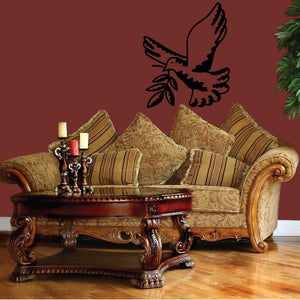 Black dove with olive branch decal on wall