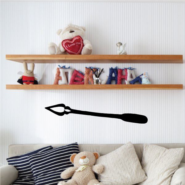Black arrow decal wall sticker with curved feather-like tail and point
