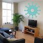 Snowflake wall decal, turquoise droplet-style design on wall