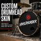 Black custom drumhead vinyl wrap sticker with red emblem and white graphic text
