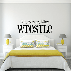 Wall decal reading 'Eat, Sleep, Play Wrestle' with large 'WRESTLE' letters