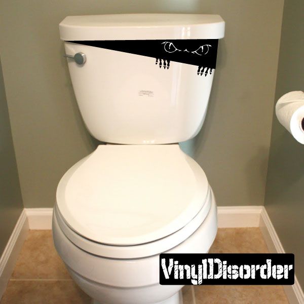Eerie toilet monster wall decal with black eyes and hanging drip design