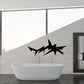 Electric shark wall decal, bold black spiky silhouette across wall