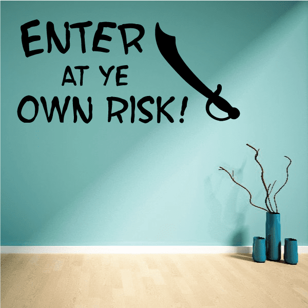 Black wall decal reading "ENTER AT YE OWN RISK!" with sword icon