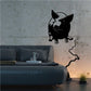 Black facing pig decal silhouette with thin outline on wall
