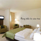 Wall decal with dark script text: “Fairy tales do come true”