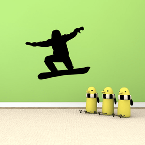 Snowboarding decal with black snowboarder silhouette and three yellow character figures