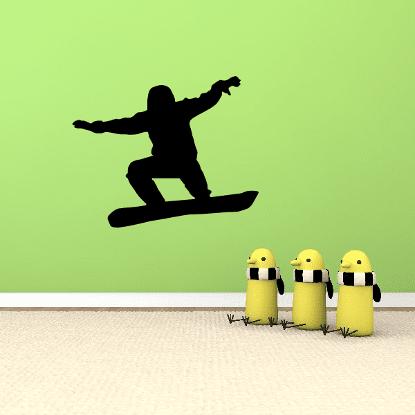 Snowboarding decal with black snowboarder silhouette and three yellow character figures