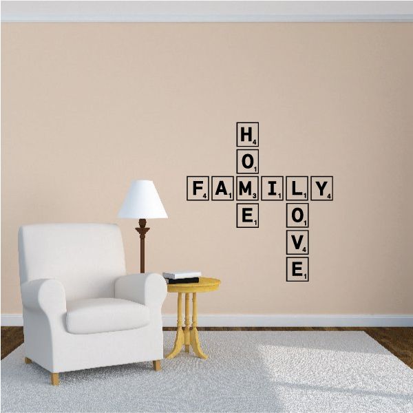 Wall decal with LOVE, FAMILY, and HOME arranged in stacked letter tiles