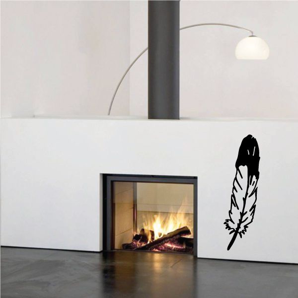 Black feather vinyl wall decal on white wall