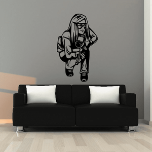 Female paintball player wall decal in black line art, helmet and marker pose
