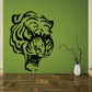 Tiger head wall decal with bold black outline and green striped interior