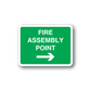 Fire assembly point sign sticker, green with white text and right arrow