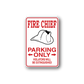 Fire chief parking only sticker with red text and fire helmet icon, warning for violators