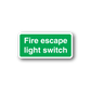 Green fire escape light switch sticker with white text label