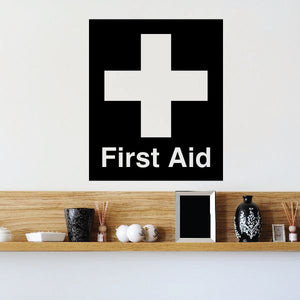First aid wall decal vinyl: black square with white cross and “First Aid” text