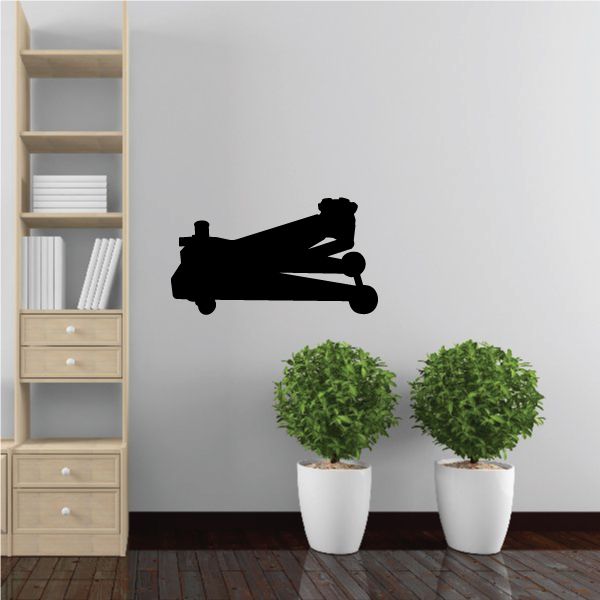 Black floor jack decal silhouette on wall