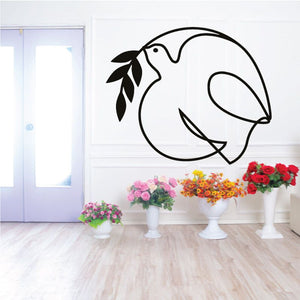 Black dove wall decal with simple outline and wings spread.
