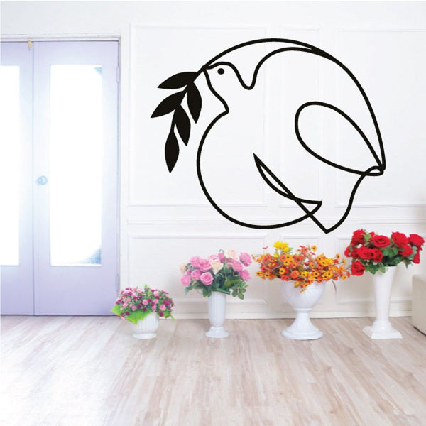 Black dove wall decal with simple outline and wings spread.