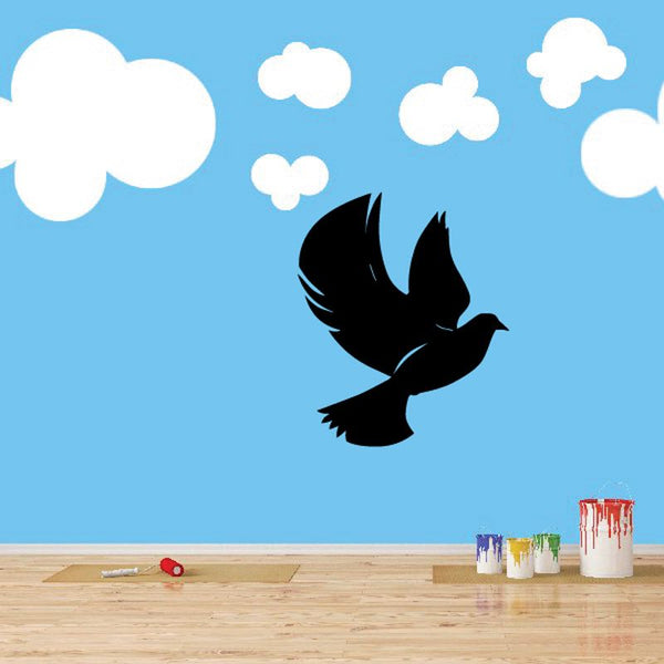 Black flying dove decal with spread wings and fluttering tail