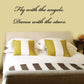 Wall decal: “Fly with the angels” and “Dance with the stars” in script.