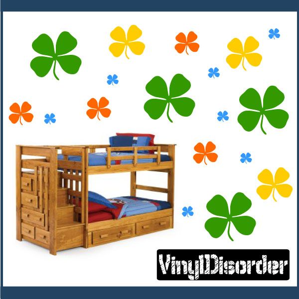 Clover wall decal kit with green four-leaf clovers and small blue flower shapes