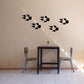 Fox paw track decal set with black footprints on wall