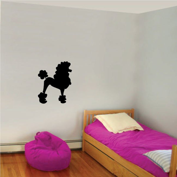 Black French poodle silhouette decal on a light wall