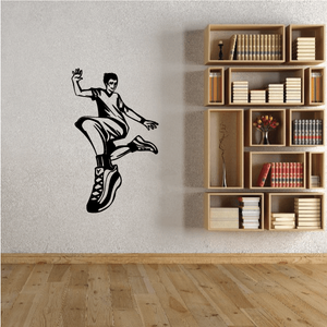 Parkour foot landing wall decal with black athlete silhouette mid-stride, front landing