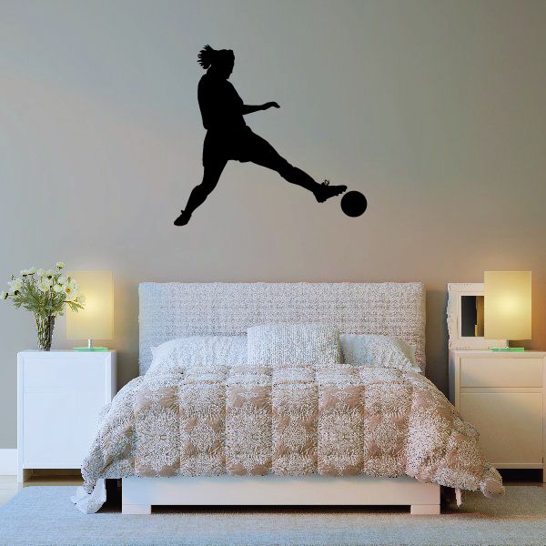 Girl soccer player wall decal, black silhouette kicking a soccer ball