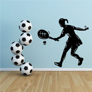 Girl tennis player wall decal with racket silhouette and black-and-white soccer balls