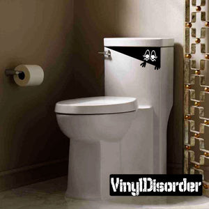 Toilet monster wall decal in black with whimsical face design on the toilet tank
