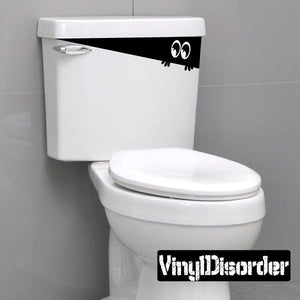 Toilet monster decal for tank, black and white with cartoon eyes above lid