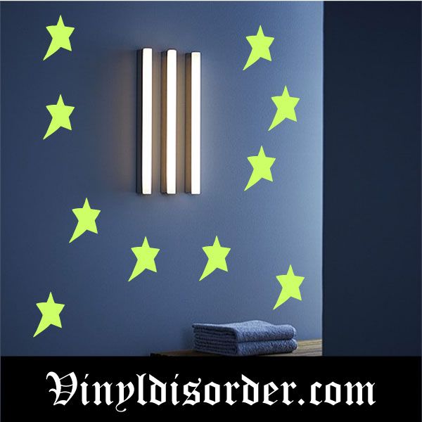 Glow-in-the-dark star decal set, neon green stars on dark blue surface