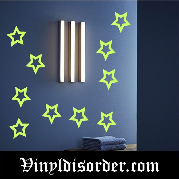 Glow-in-the-dark star wall decal sheet with multiple green outlined stars