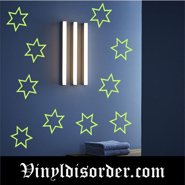 Glow-in-the-dark star wall decal set with green six-pointed stars