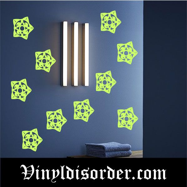 Glow-in-the-dark geometric star decals, neon green starburst shapes