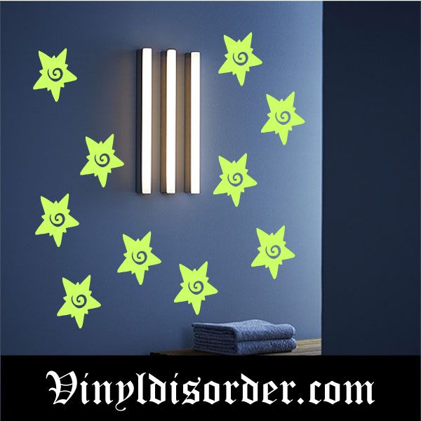 Glow-in-the-dark star swirl wall decals with lime green stars on wall
