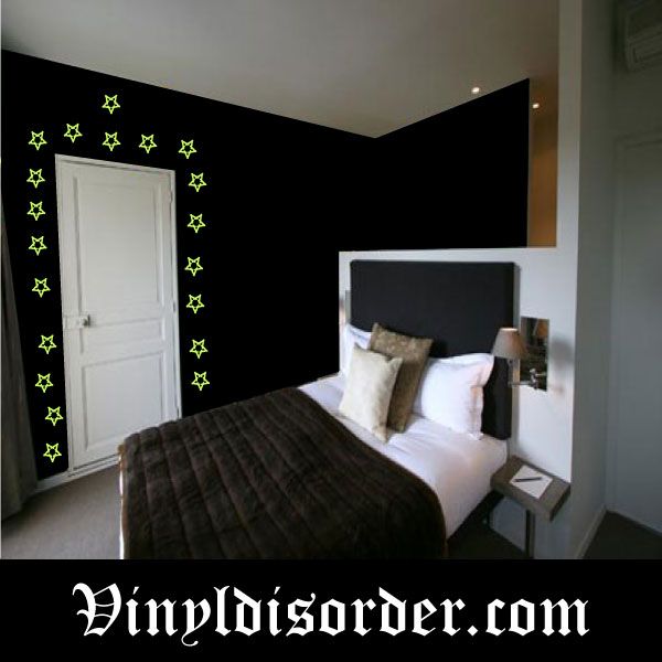 Glow-in-the-dark star wall decals: small outlined stars in neon green for corners