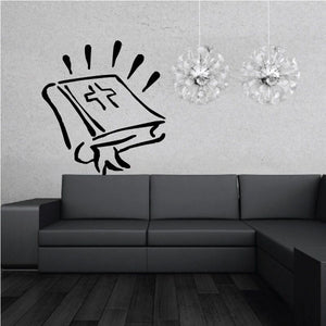 Glowing open Bible wall decal with radiating light lines