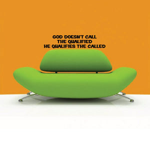 Inspirational quote decal with black uppercase text on green upholstered chair